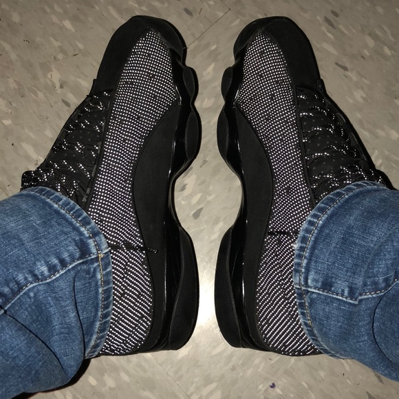 black cat 13 on feet